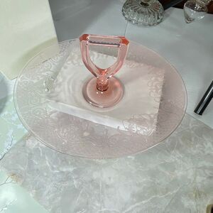 Pink Depression glass etched floral scroll pattern oval platter handle.